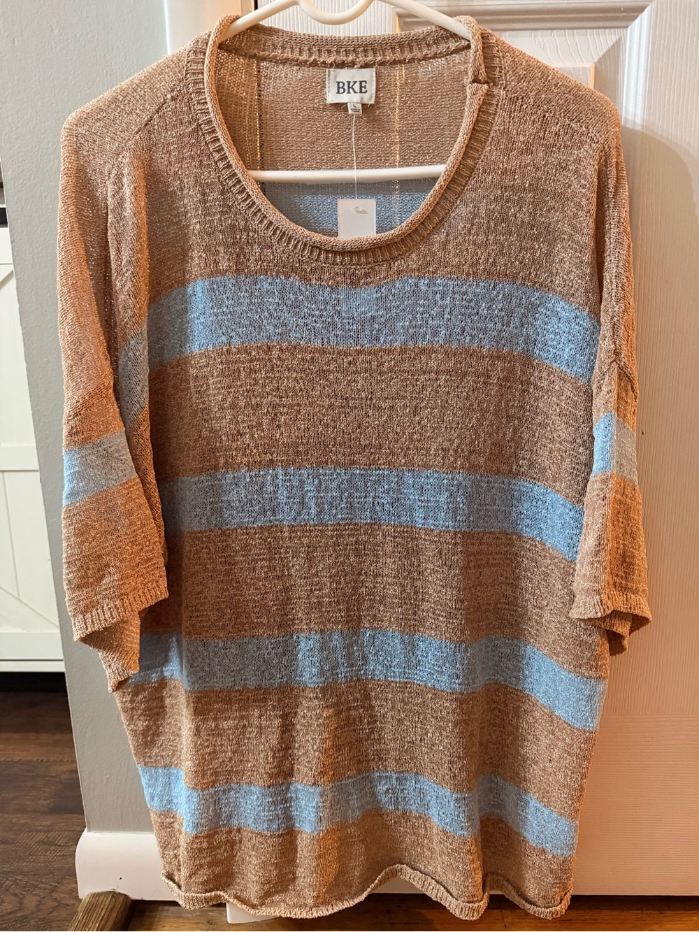 Buckle sweater tops